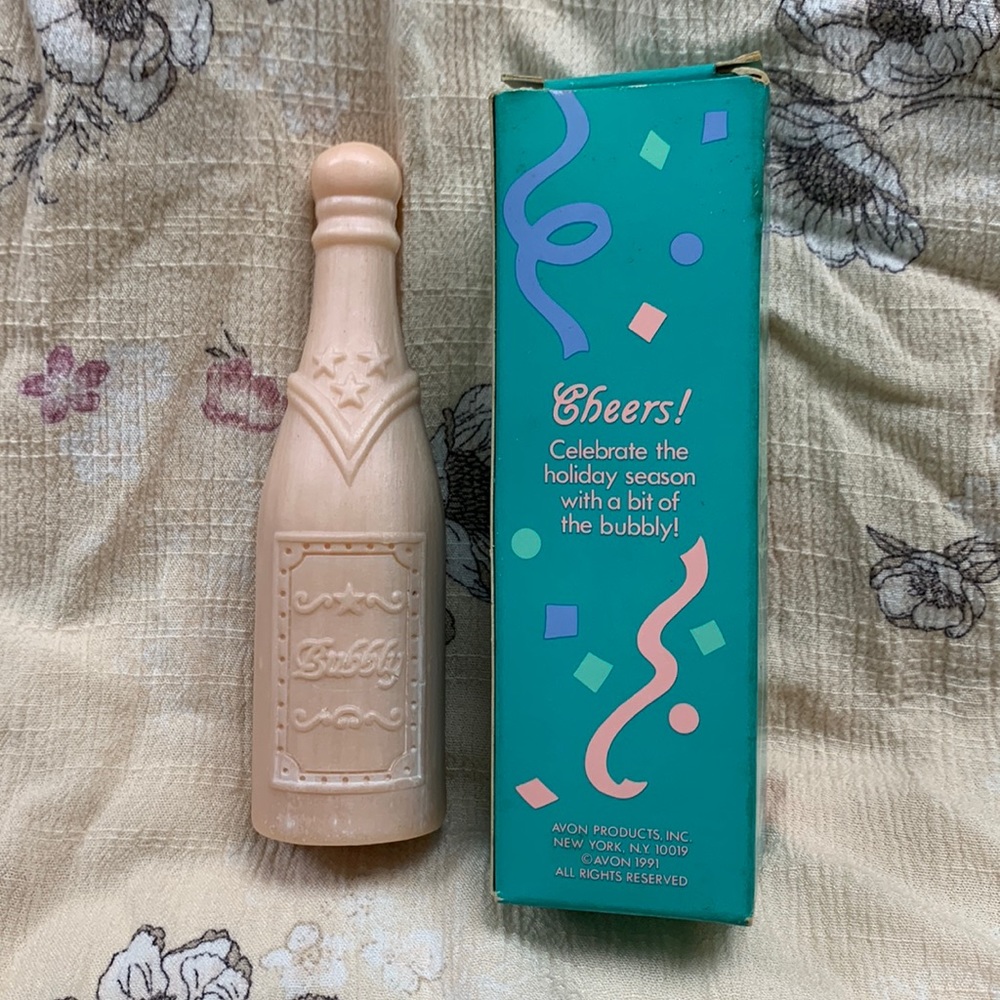 Avon Products Cheers! Celebrate the holiday season (1991) Champagne shaped soap.